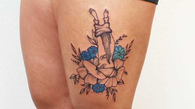 Blue flowers, dressing lady tattoo