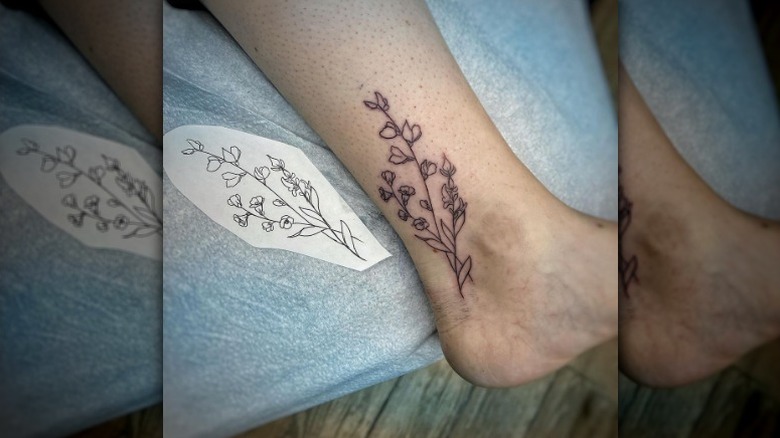 Floral ankle tattoo