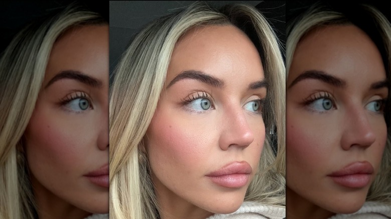 A woman with arched and filled eyebrows