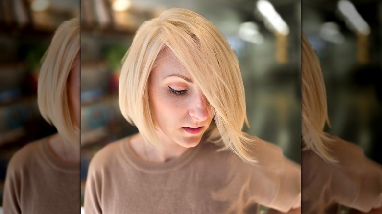 A woman with a platinum blonde bob