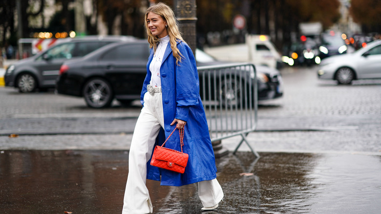 A woman in a blue jacket 