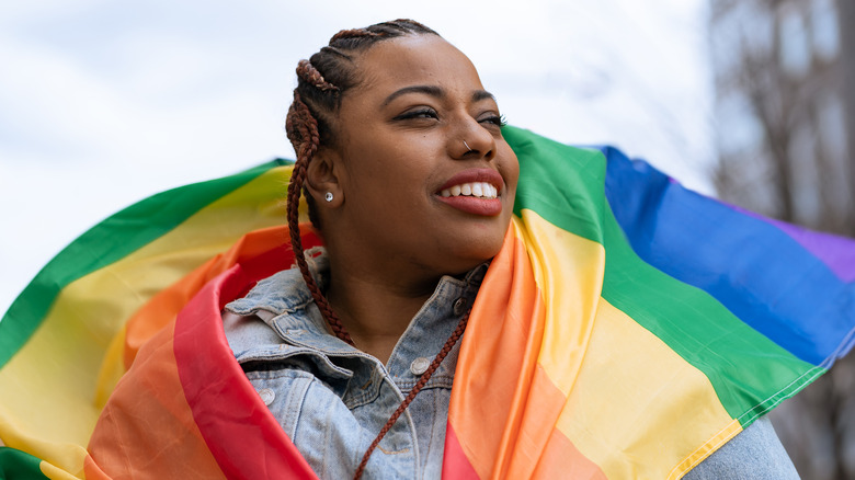 Woman wearing Pride flag
