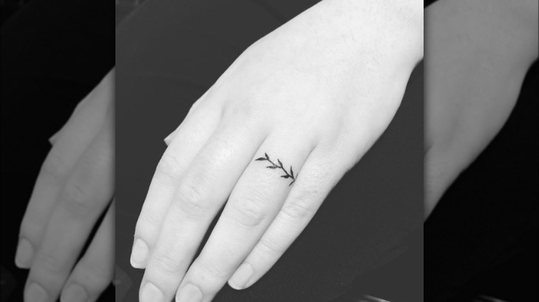 Engagement band tattoo