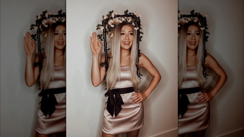 woman dressed as Regina George from Mean Girls