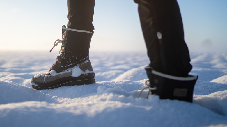 Woman wearing snow boots