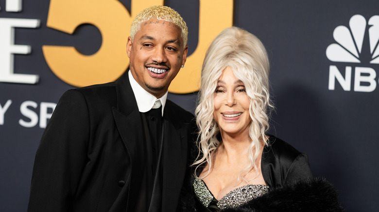 Cher on the red carpet with Alexander "AE" Edwards