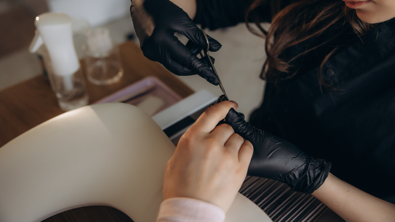 Woman getting a manicure