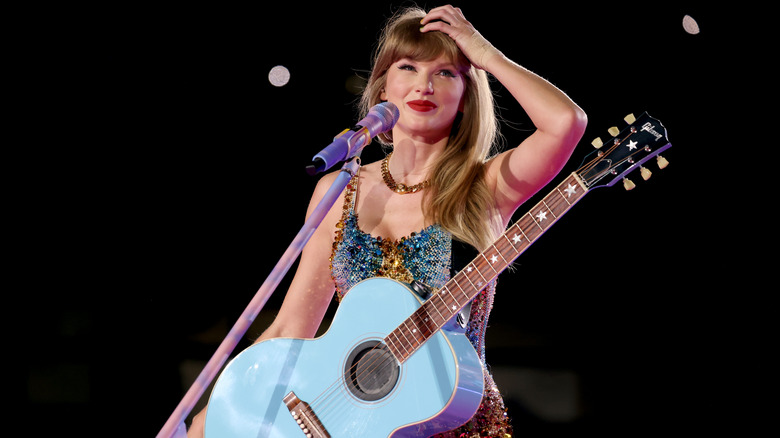 Taylor Swift smiling on stage