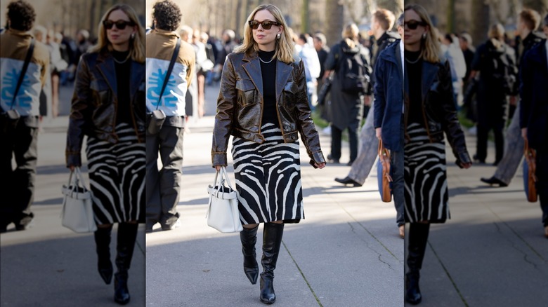 Woman wears zebra print skirt