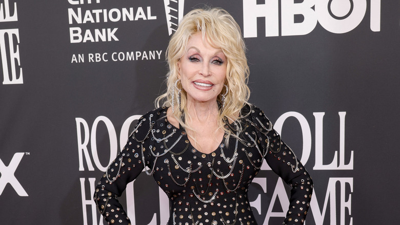 Dolly Parton in a black dress at an event