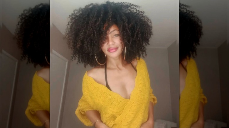 A woman with a big afro