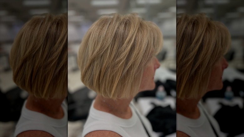 A woman with a heavily layered bob haircut