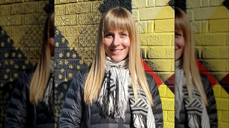 A woman with full bangs