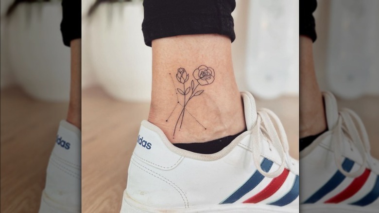 Rose and cancer constellation tattoo