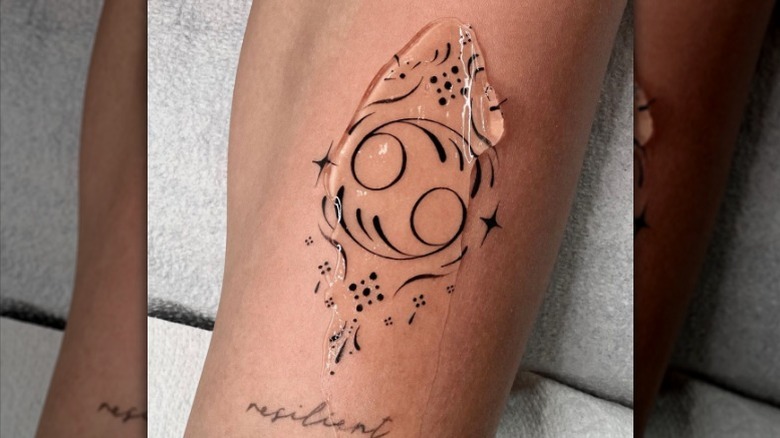 Cancer crab claw tattoo