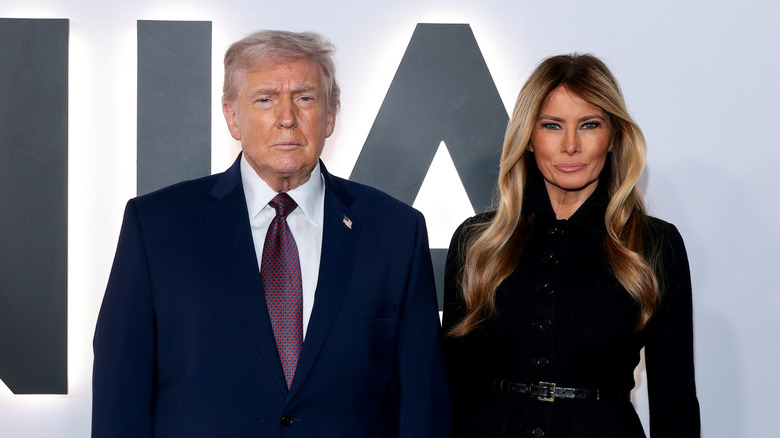 President Donald Trump standing next to Melania Trump