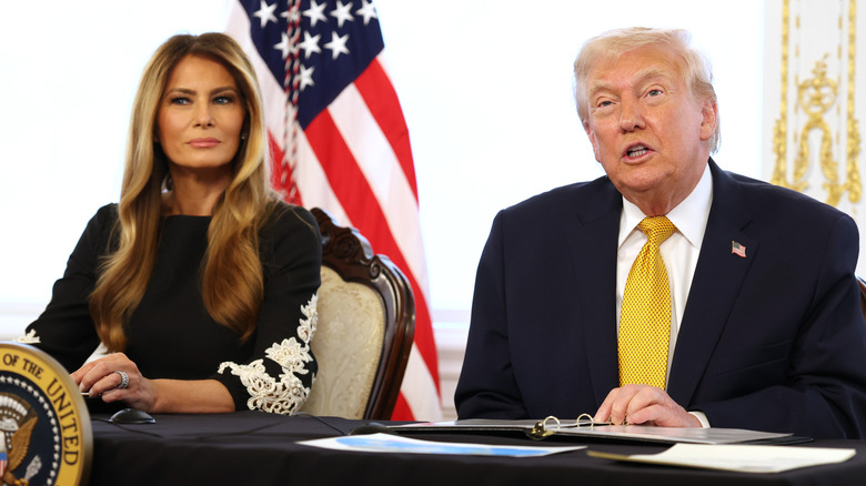 First Lady Melania Trump sitting next to President Donald Trump