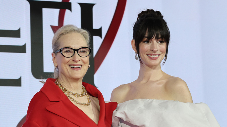 Meryl Streep and Anne Hathaway posing for a photo together