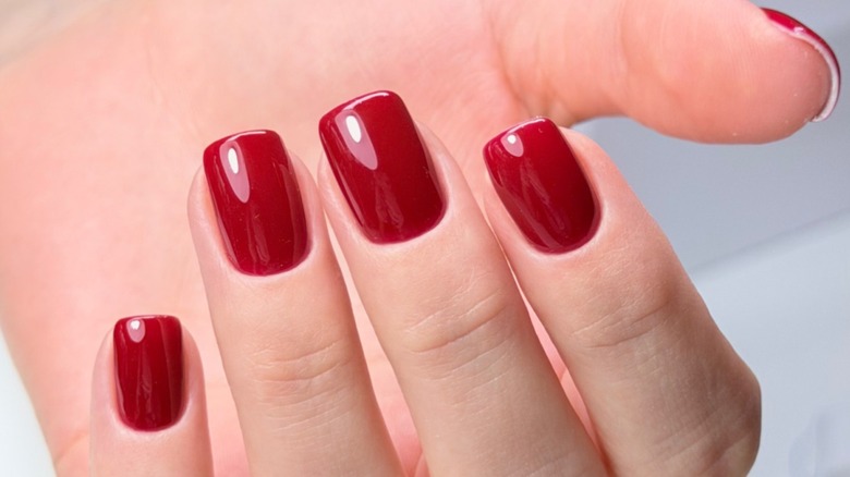 Rich red manicure on short nails