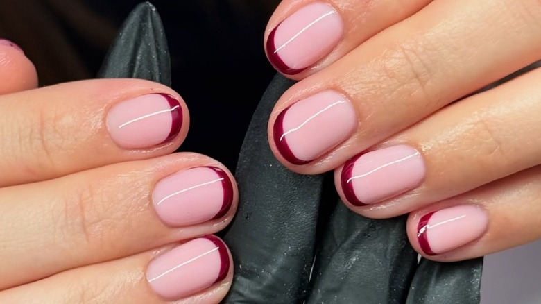 Burgundy micro French tips on short nails