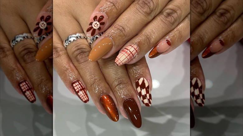 A woman showcases her manicure
