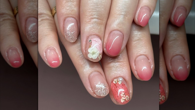 A woman showing off her manicure