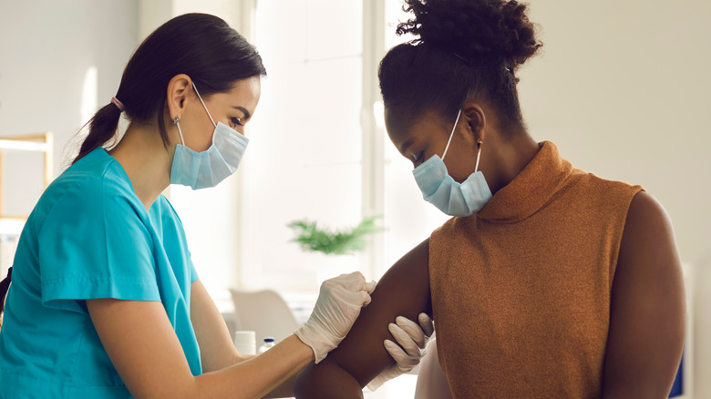 Woman getting a Covid vaccine