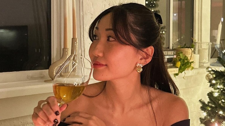 A woman with curtain bangs