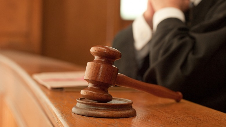 Gavel in courtroom with judge