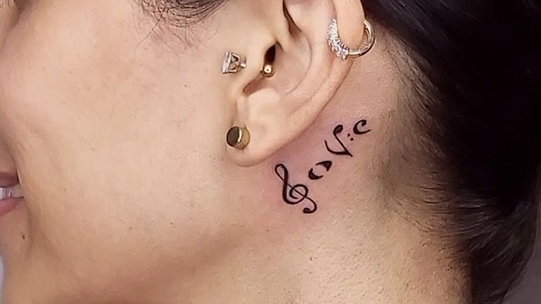 Love musical notes tattoo