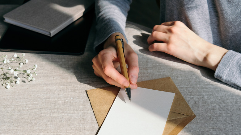 woman writing note