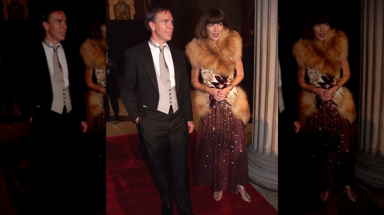 Anna Wintour at the 1999 Met Gala in a fur-trim dress with a sequin skirt
