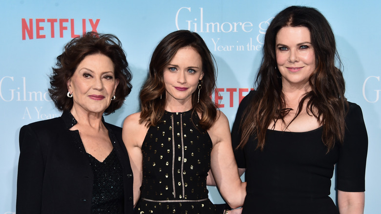Kelly Bishop, Alexis Bledel and Lauren Graham all wearing black dresses on the
