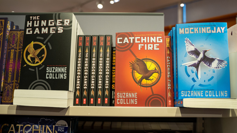 View of "The Hunger Games" trilogy books by Suzanne Collins on a store shelf