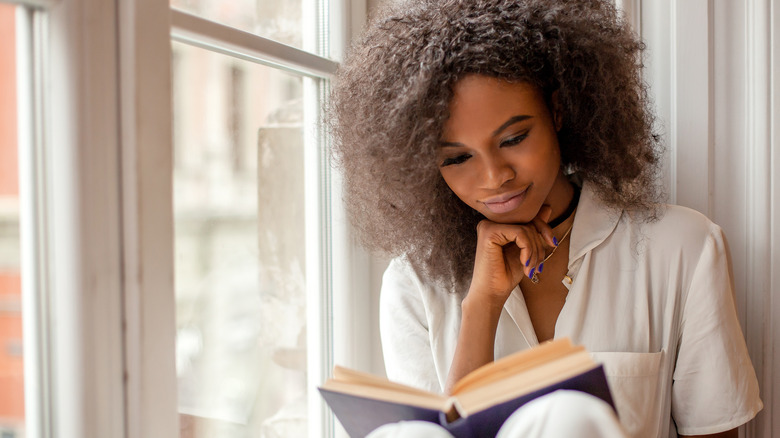 Woman reading book 