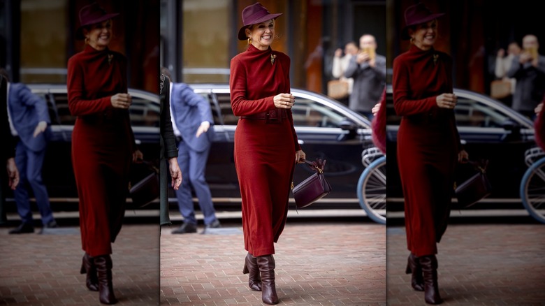 Queen Maxima of the Netherlands in reds and burgundy