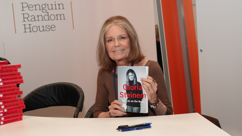 Author Gloria Steinem poses for photographs with her newest book during BookExpo America held at the Javits Center on May 28, 2015
