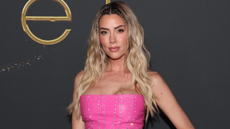 Heather Rae El Moussa posing on the red carpet