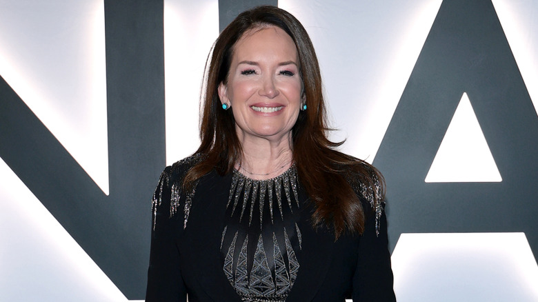 Brooke Rollins in a black dress