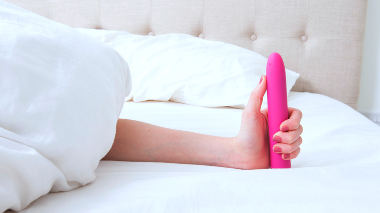 hand holding vibrator