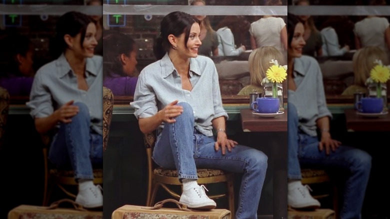 Monica Geller in jeans and oxford shirt