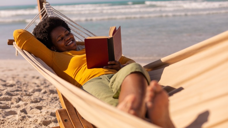 Woman reading at the beach