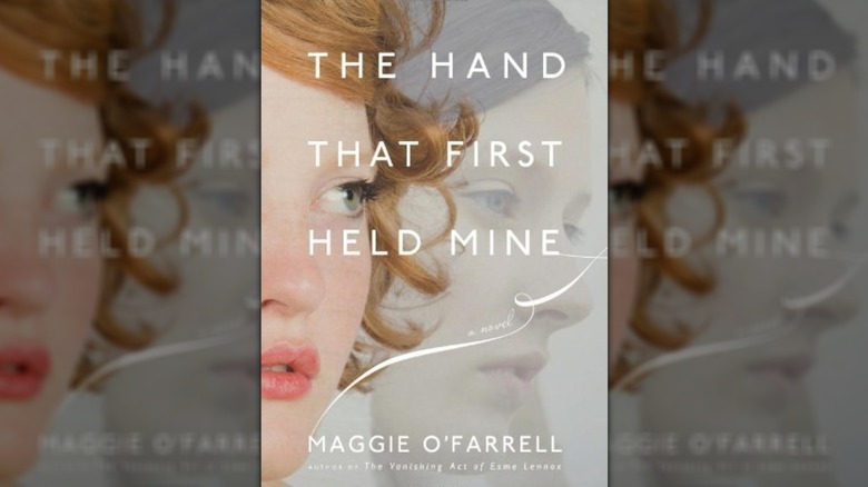 The cover of The Hand That First Held Mine