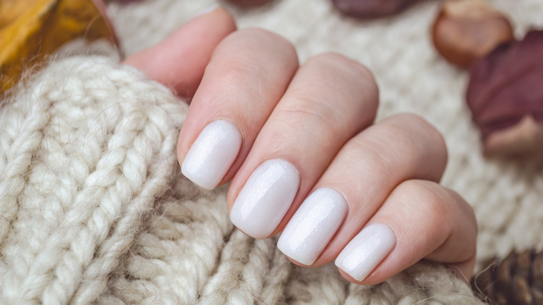 Woman wearing press on nails 