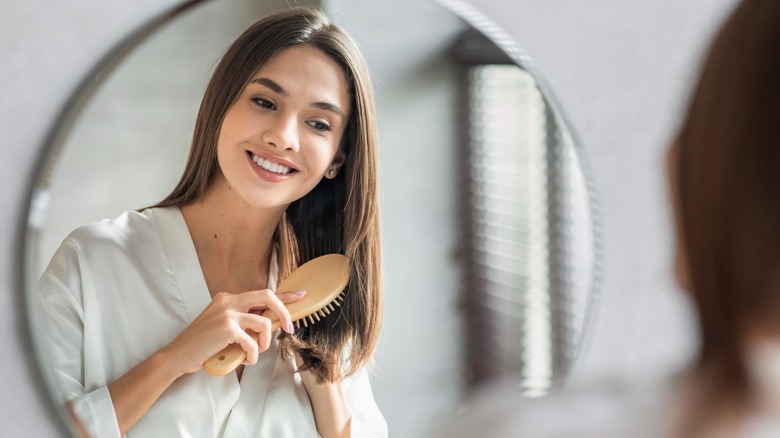 Woman brushing her hair