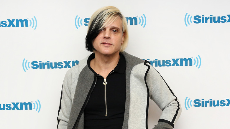 Rob Fusari in a hoodie at an event