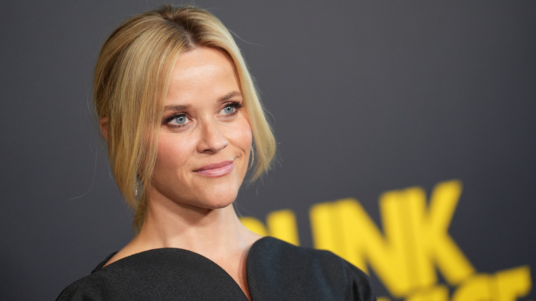 Reese Witherspoon posing at a 2024 movie premiere