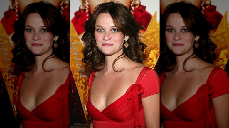 Reese Witherspoon with dark hair and a red dress in 2004