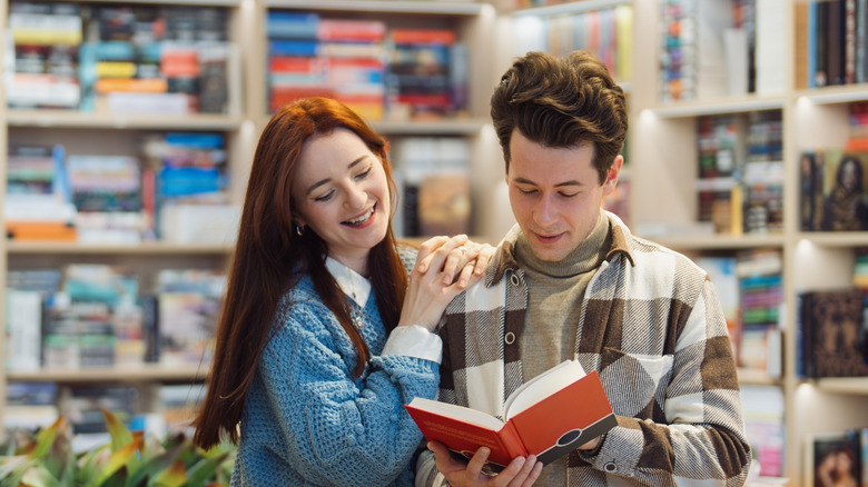 Couple shopping together in a bookstore