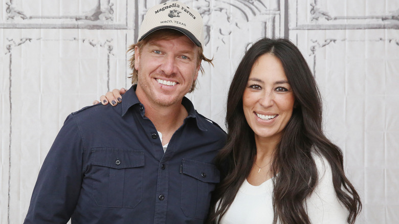 Chip and Joanna Gaines at an event smiling